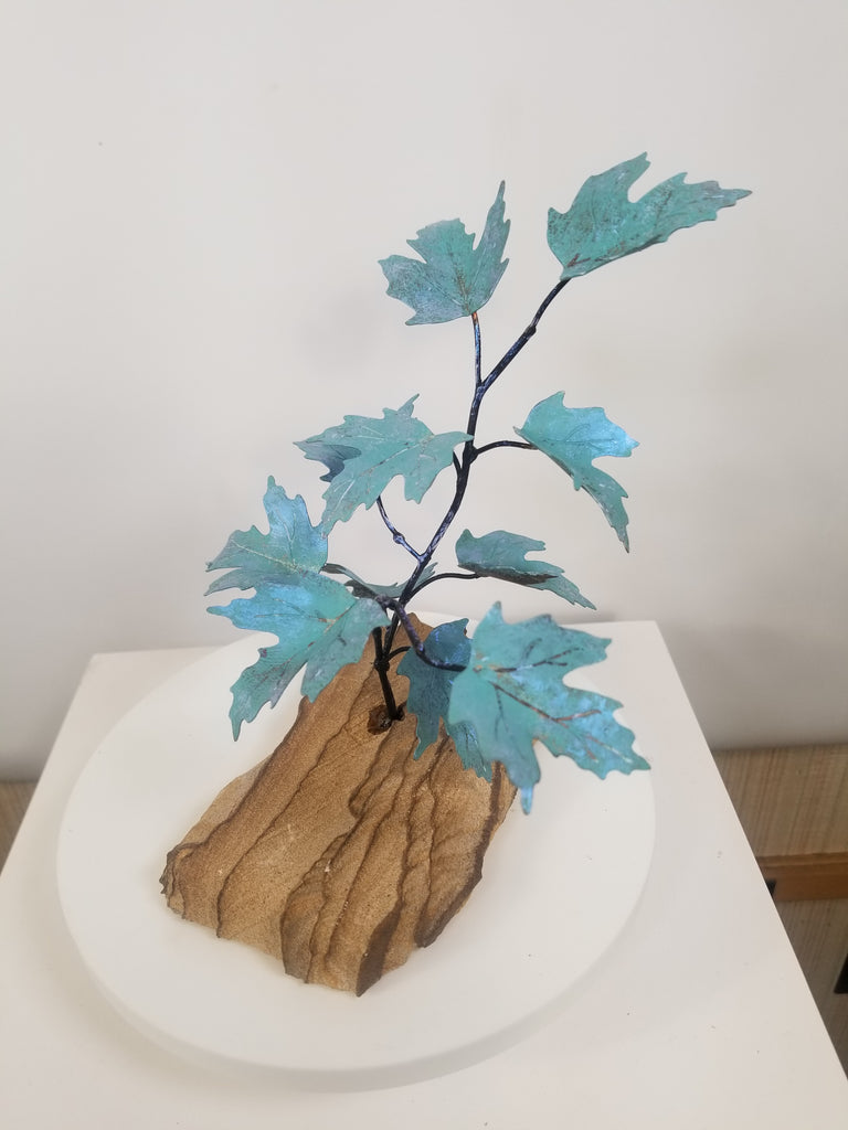 Maple leaves (patina) on stone base Wall Art by Bovano