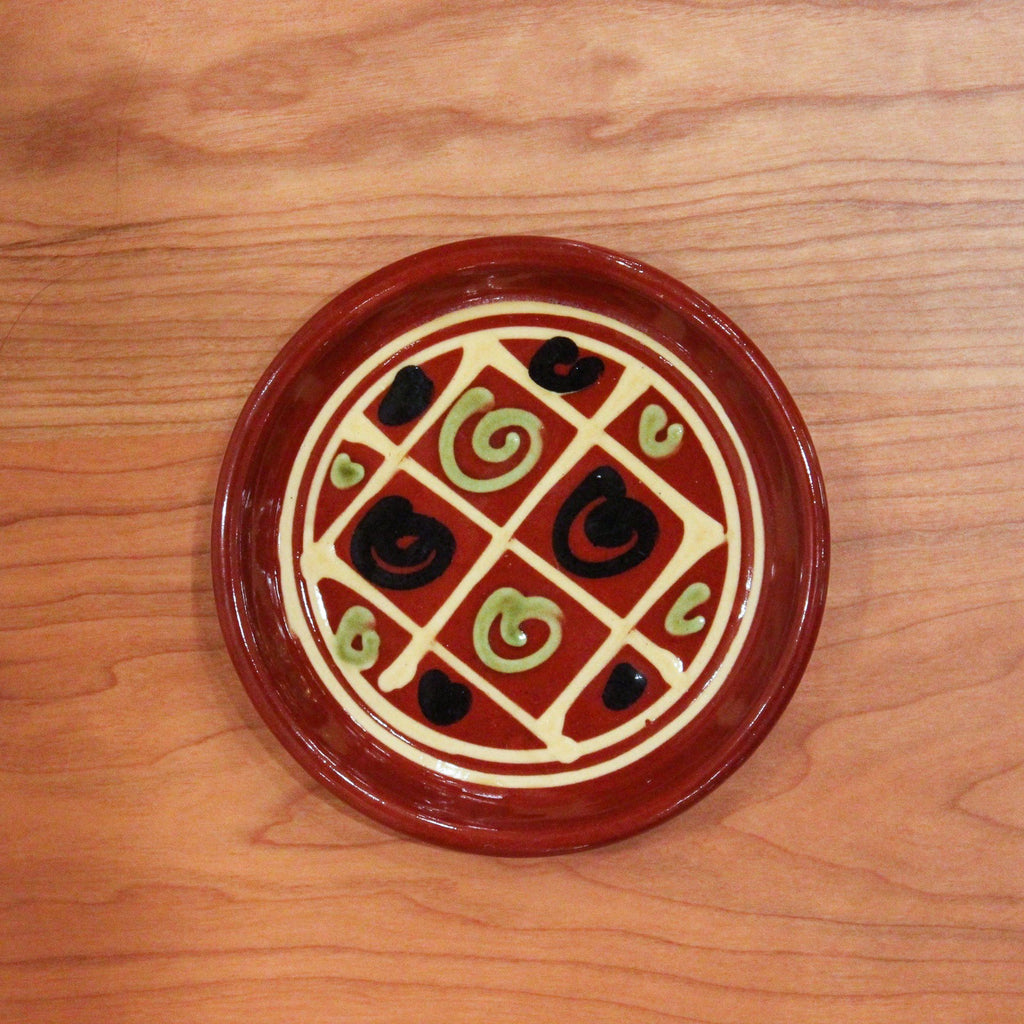 Redware Coaster with Green and Black Swirl