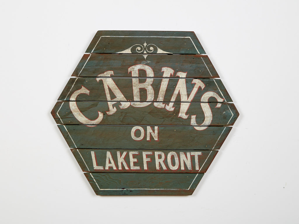 Cabins on Lakefront Hexagonal Sign in Green Americana Art