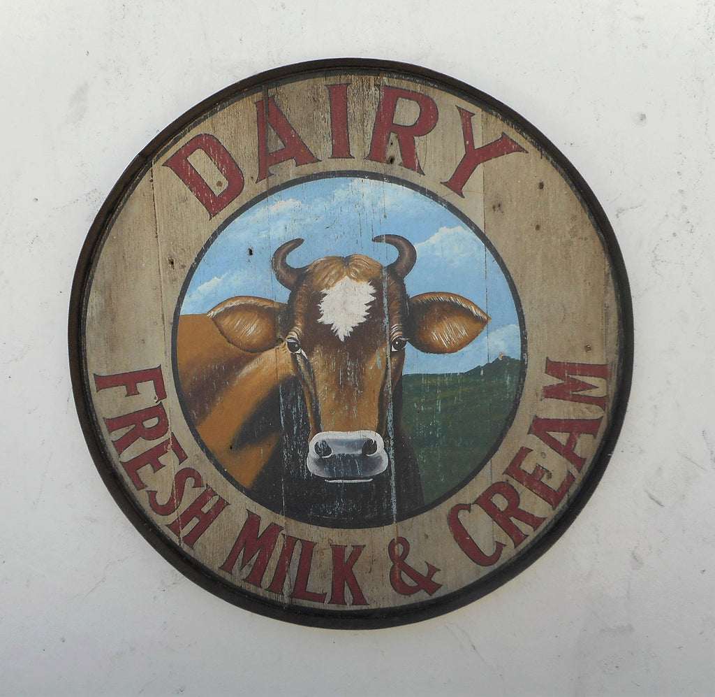 Dairy Fresh Milk and Cream with Cow Sign